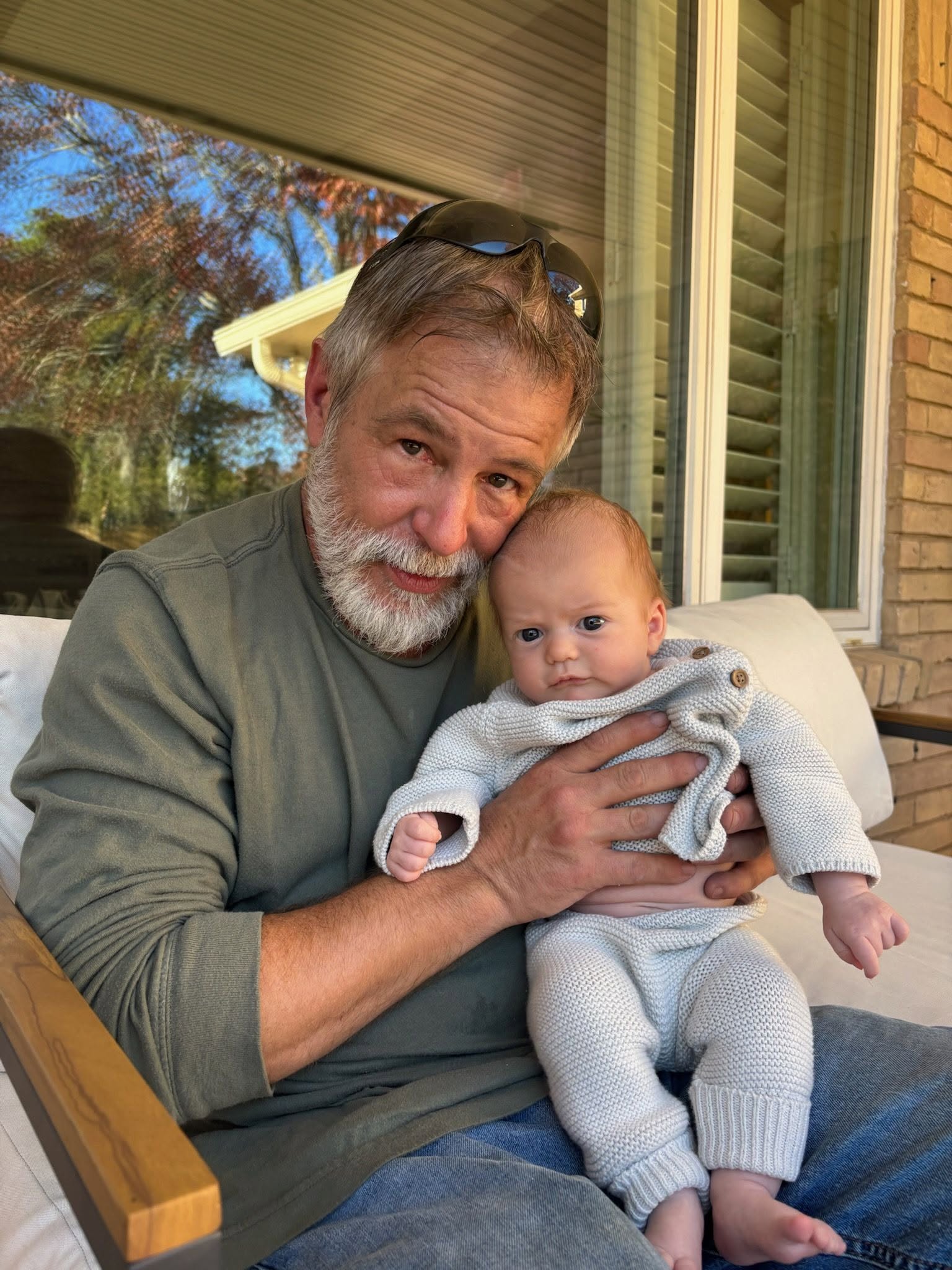 Curtis Lee Meador later in life with a baby